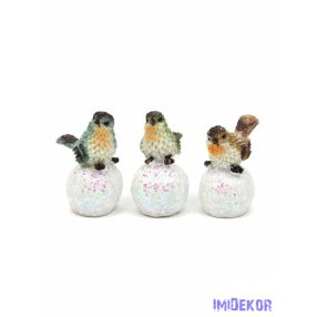 Madár figura hógolyón