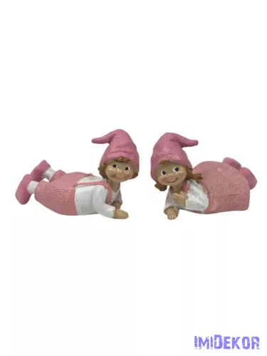 Rózsaszín ruhás fekvő figura